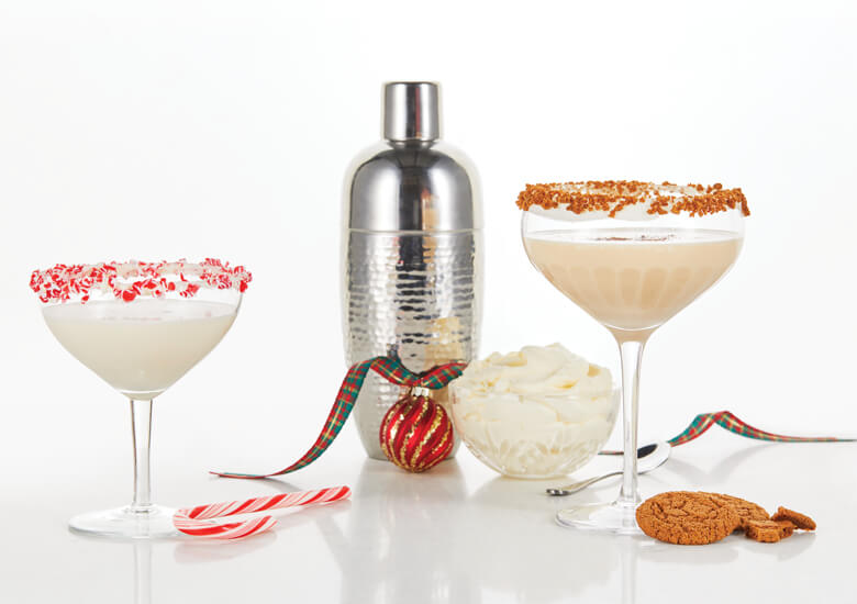 Creamy mascarpone martinis with peppermint flakes on rim of glasses