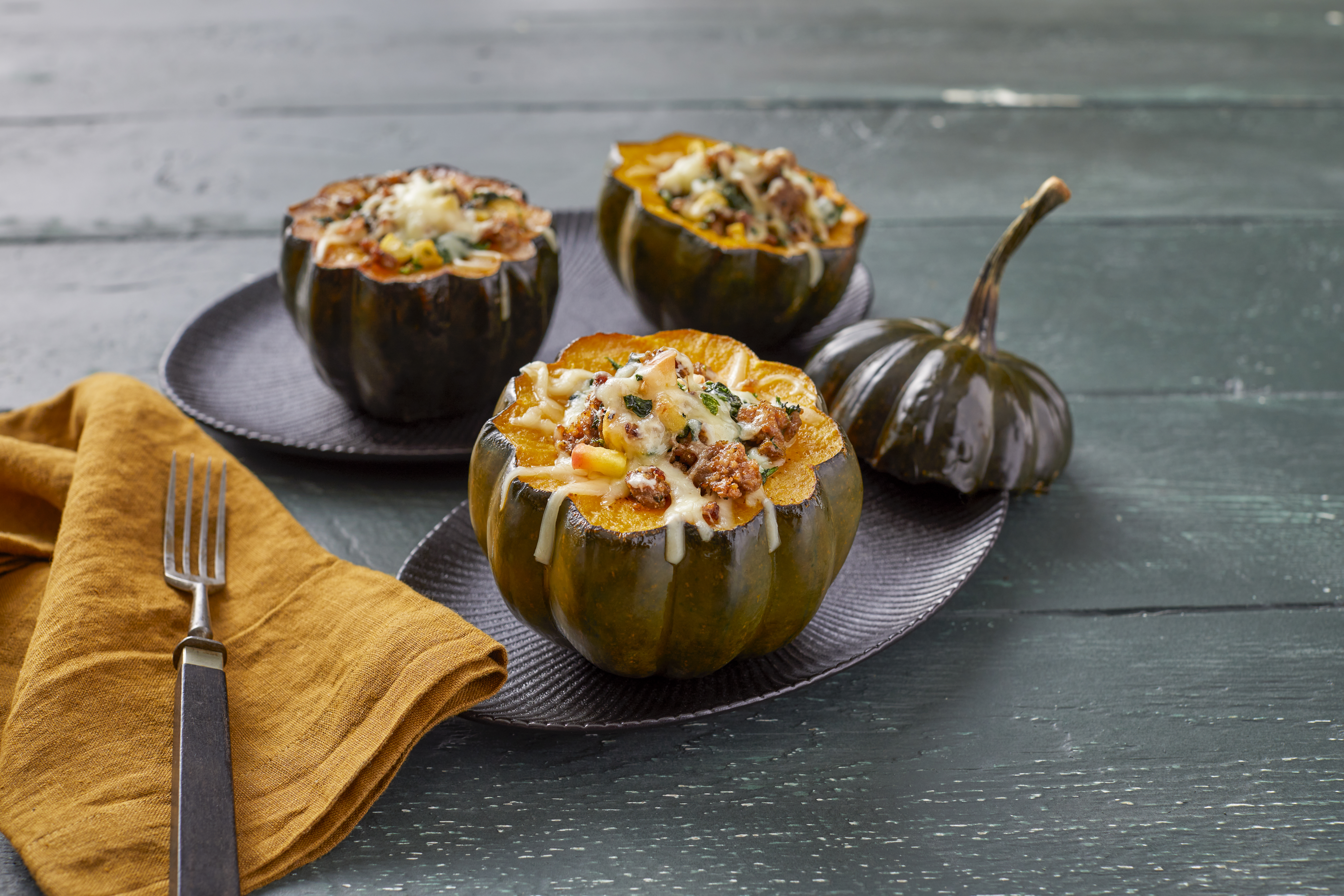 Wisconsin Cheese Sausage-Stuffed Acorn Squash with Aged Gouda recipe